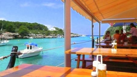 Sa Nacra restaurant/bar, Santandria cove, Menorca, looking west