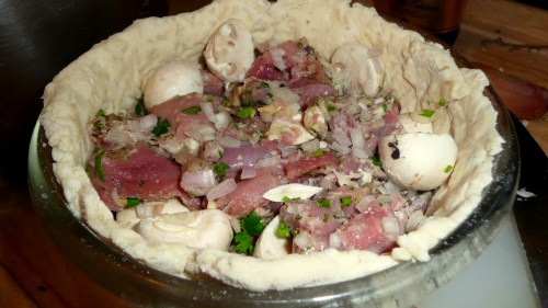 game pudding before lid and steaming Steamed game pudding assembled without suet pastry lid